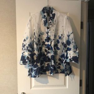 Light weight button up summer top. 100% polyester. Ali Miles 1X